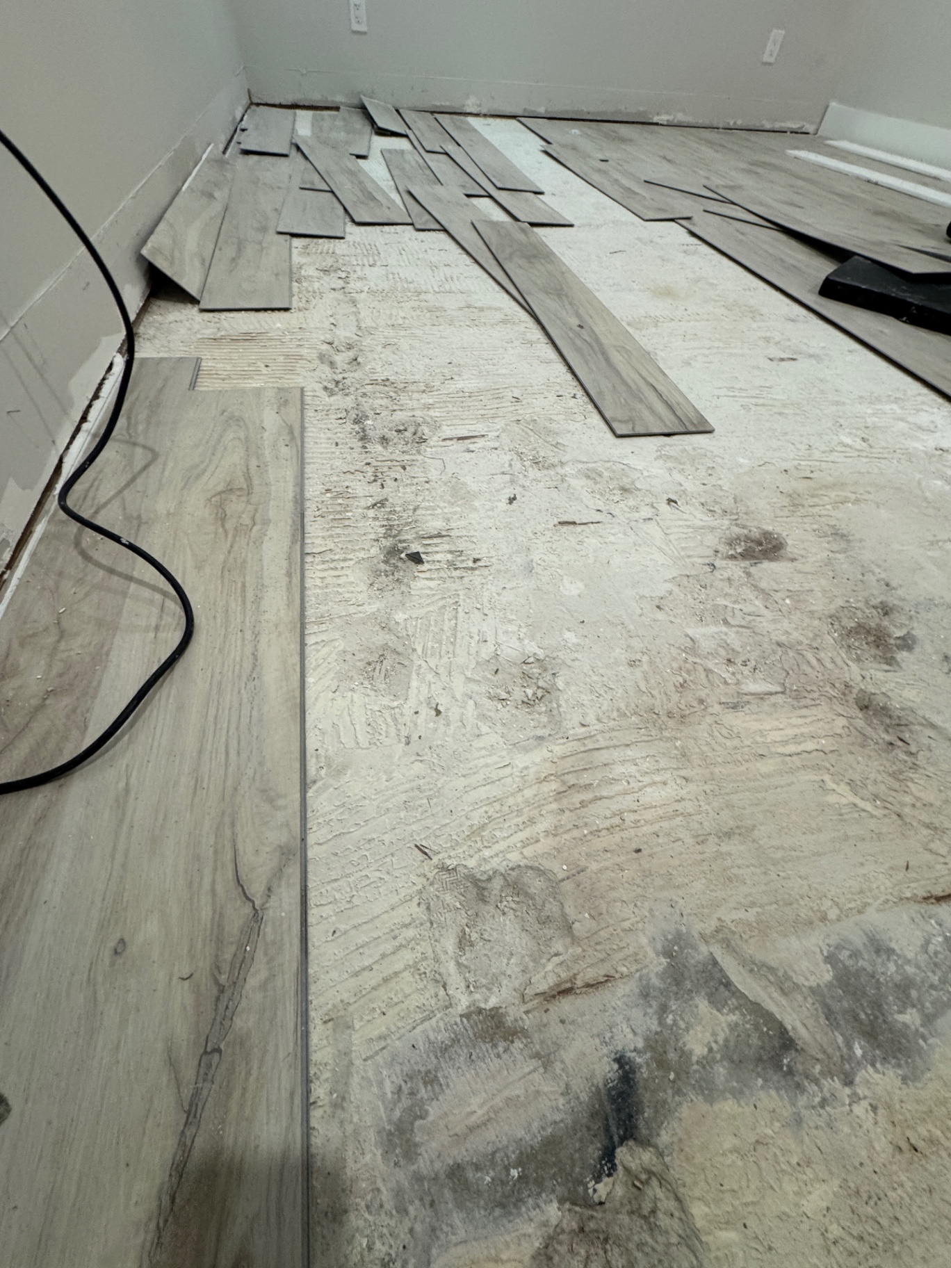 Existing flooring removed to evaluate a previous installation problem before corrective repair.
